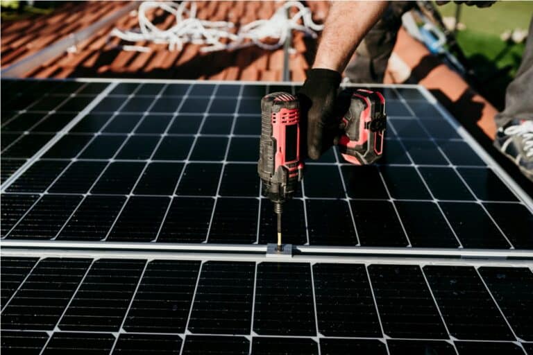hand of technician assembling solar panels with dr 2022 10 11 20 15 31 utc