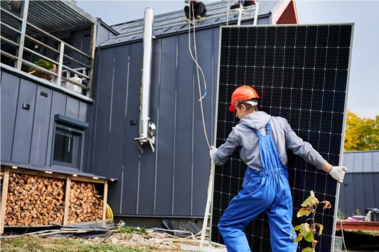technicians carrying photovoltaic solar module whi 2023 08 22 00 25 37 utc
