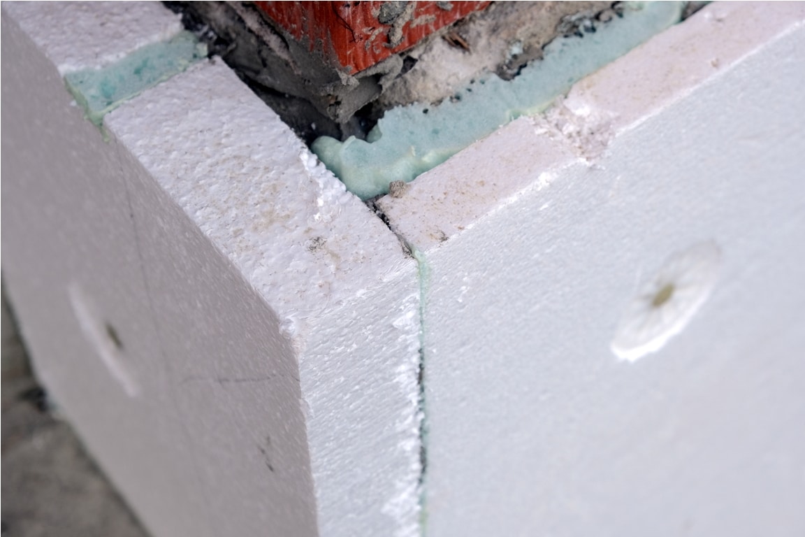 close up detail of brick house wall with rigid sty 2022 11 22 17 43 38 utc