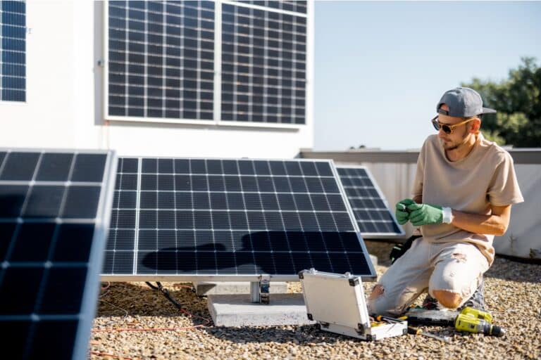 man installing solar panels on the roof of his hou 2023 11 23 03 40 56 utc