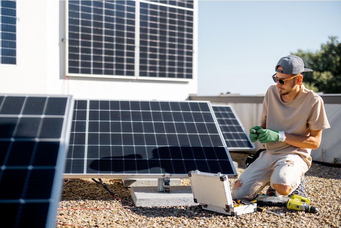 man installing solar panels on the roof of his hou 2023 11 23 03 40 56 utc
