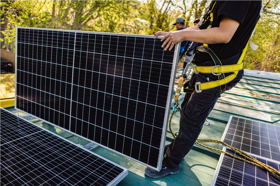 two workers technicians installing heavy solar pho 2023 06 06 17 55 06 utc