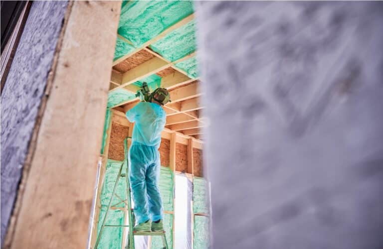 worker spraying polyurethane foam for insulating w 2022 08 23 20 06 31 utc