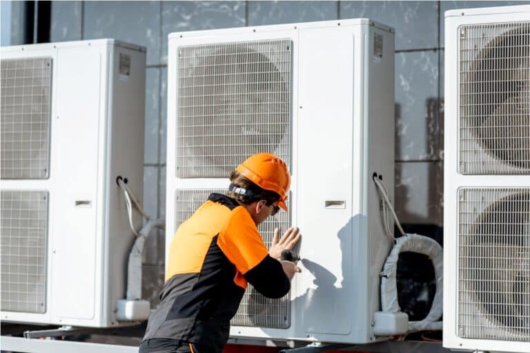 workman installing outdoor unit of the air conditi 2021 09 01 15 21 03 utc