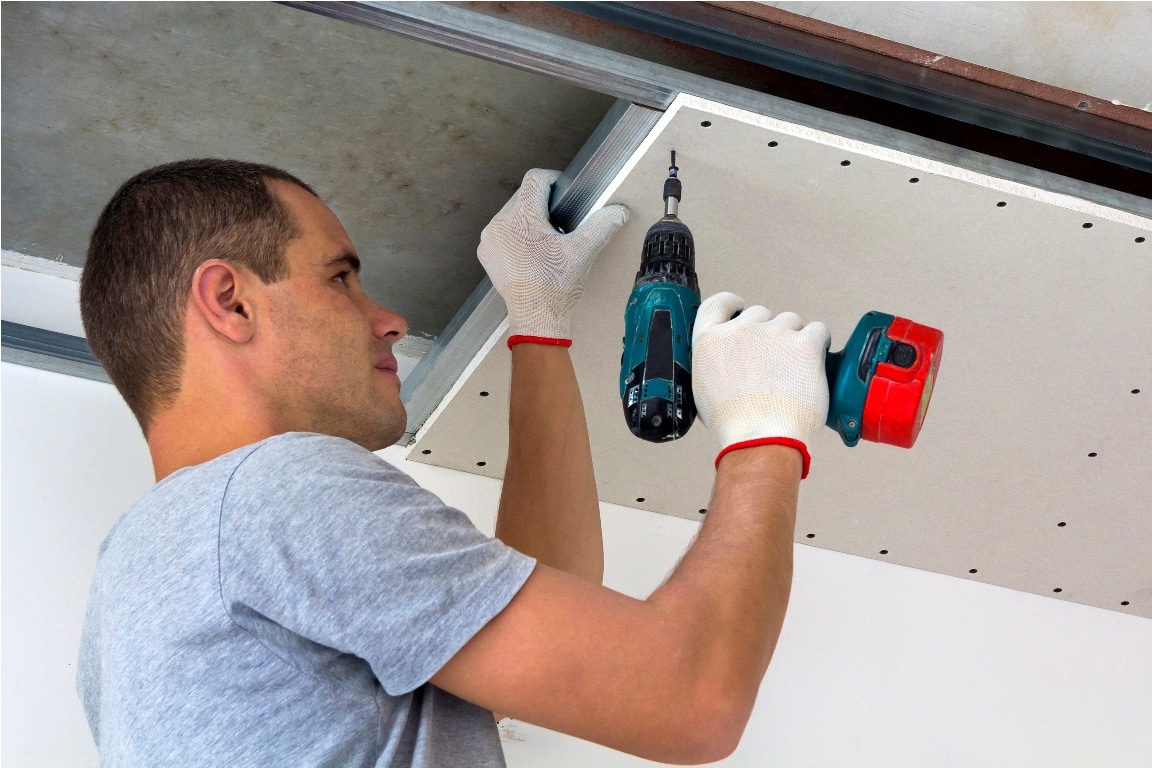 young man in usual clothing and work gloves fixing 2022 08 19 05 57 43 utc
